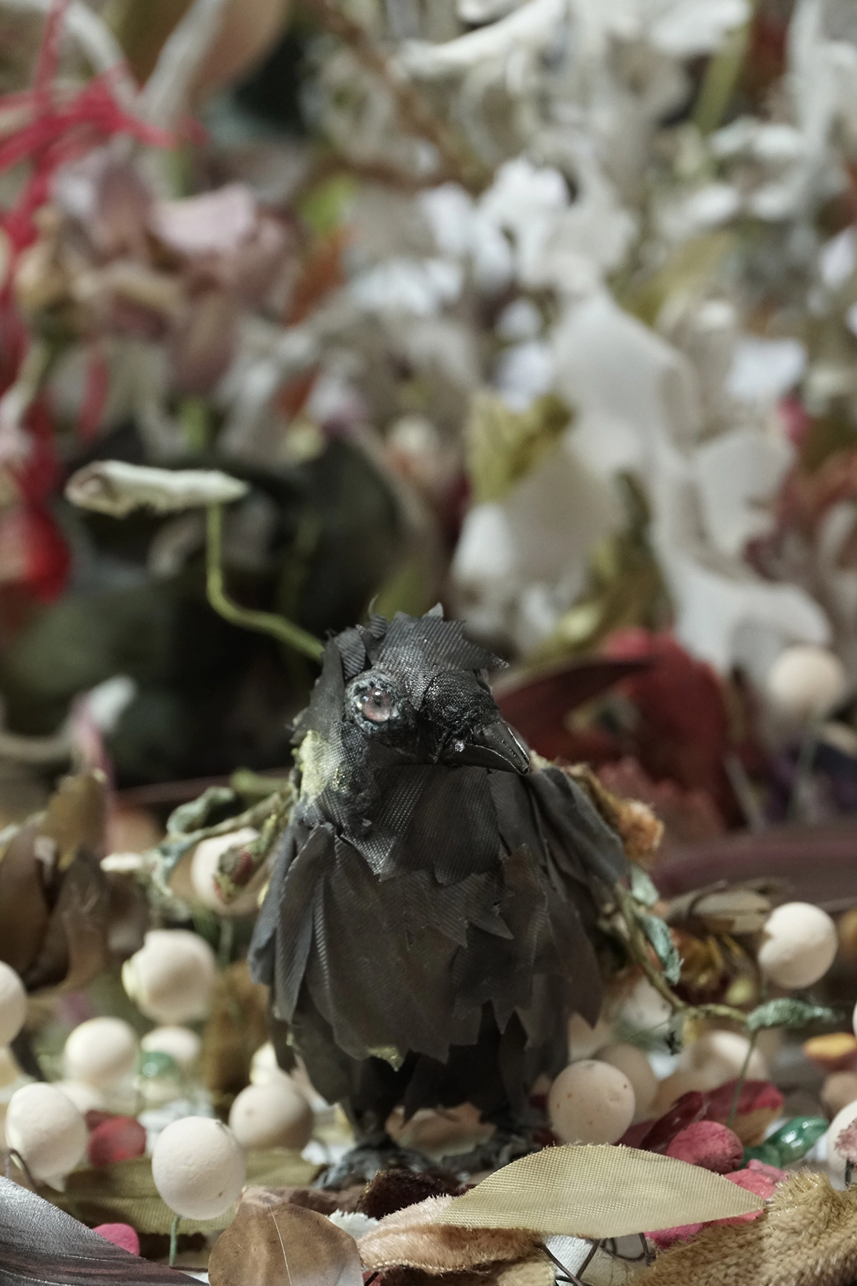 Artificial crow with flowers, 2018